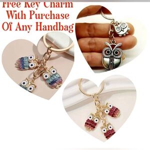 FREE PURSE CHARM/KEY RING  Purchase any handbag and receive a free purse charm